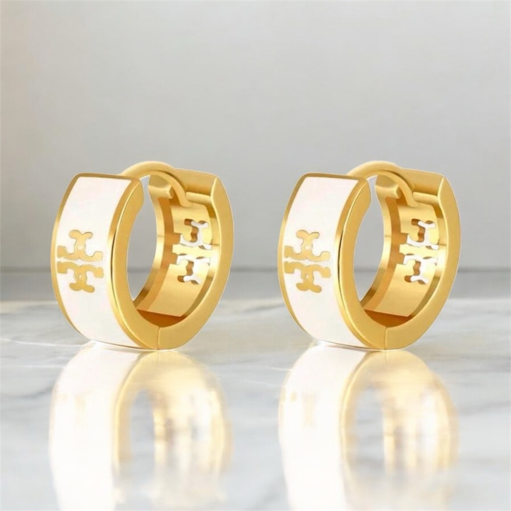 TORY BURCH GOLD AND WHITE HUGGIES HOOP EARRINGS